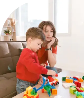 Child playing with Montessori toy